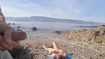 A Daring Exhibitionist Exposes Himself To A Nudist Milf Who Eagerly Gives Him Oral Pleasure On The Beach